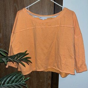 Orange Victoria’s Secret large crop top